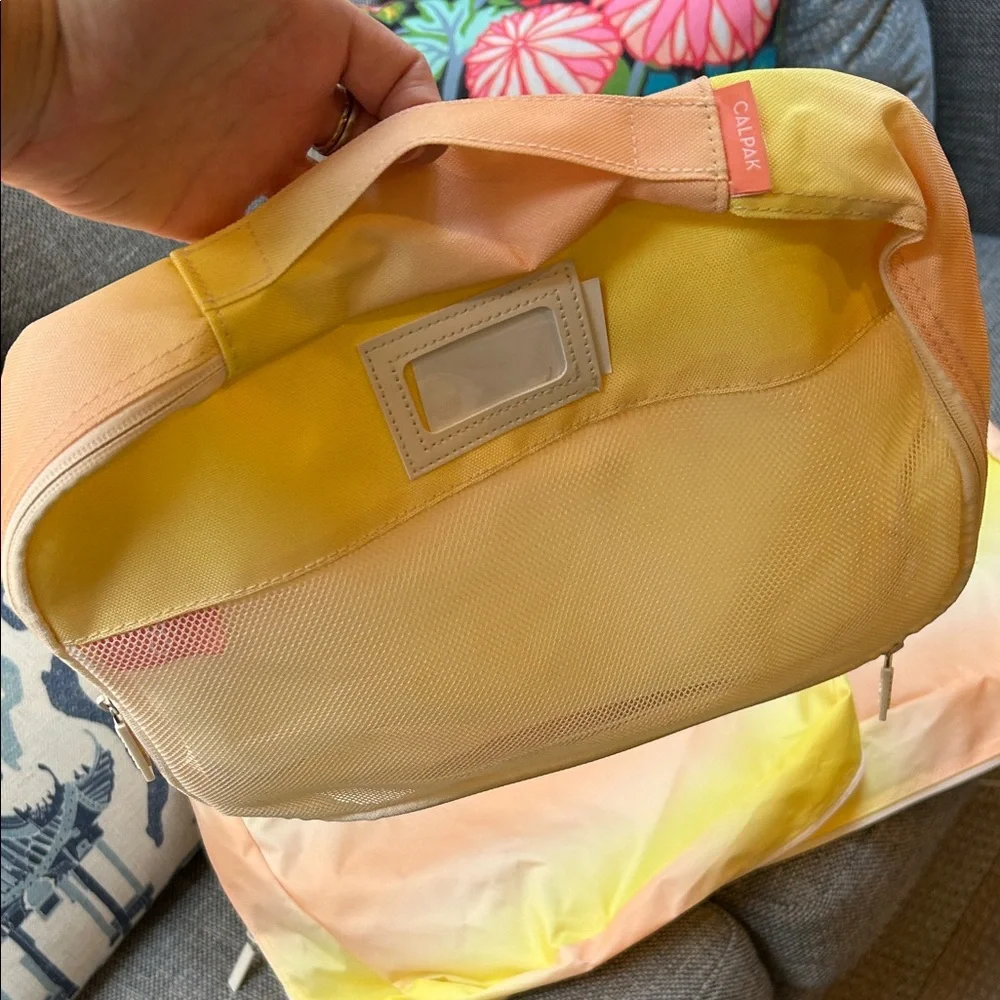 Calpak Yellow and Cream Garment Bags